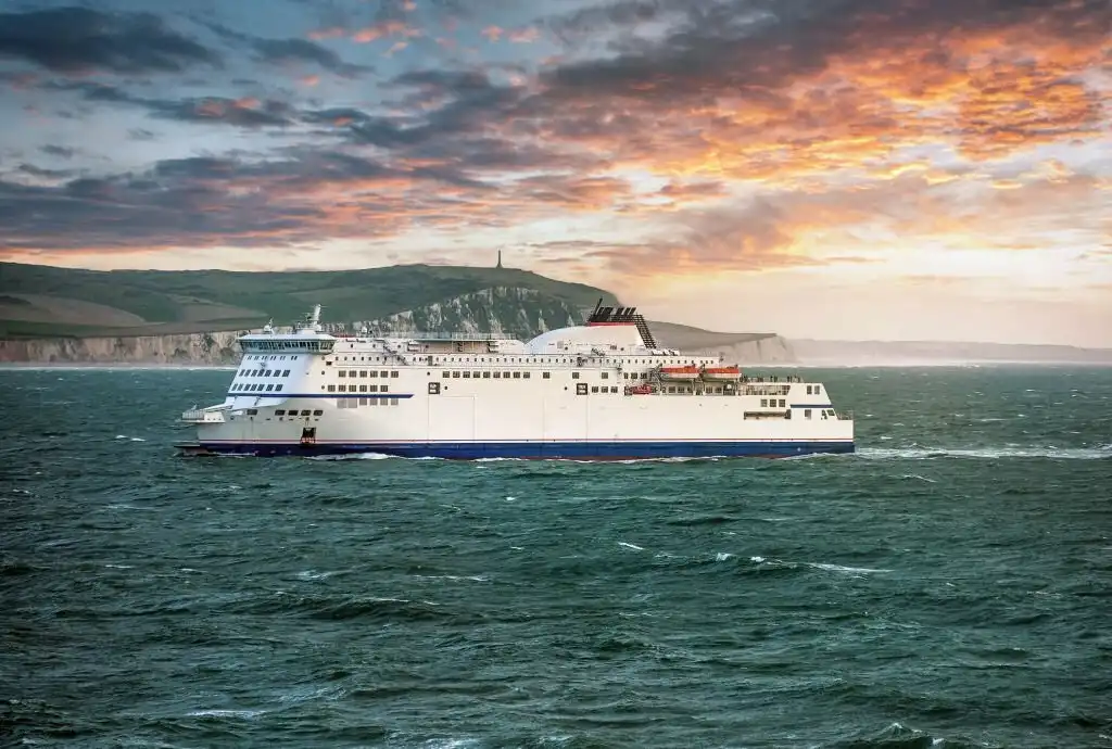 Ferry crossing the English Channel at sunset